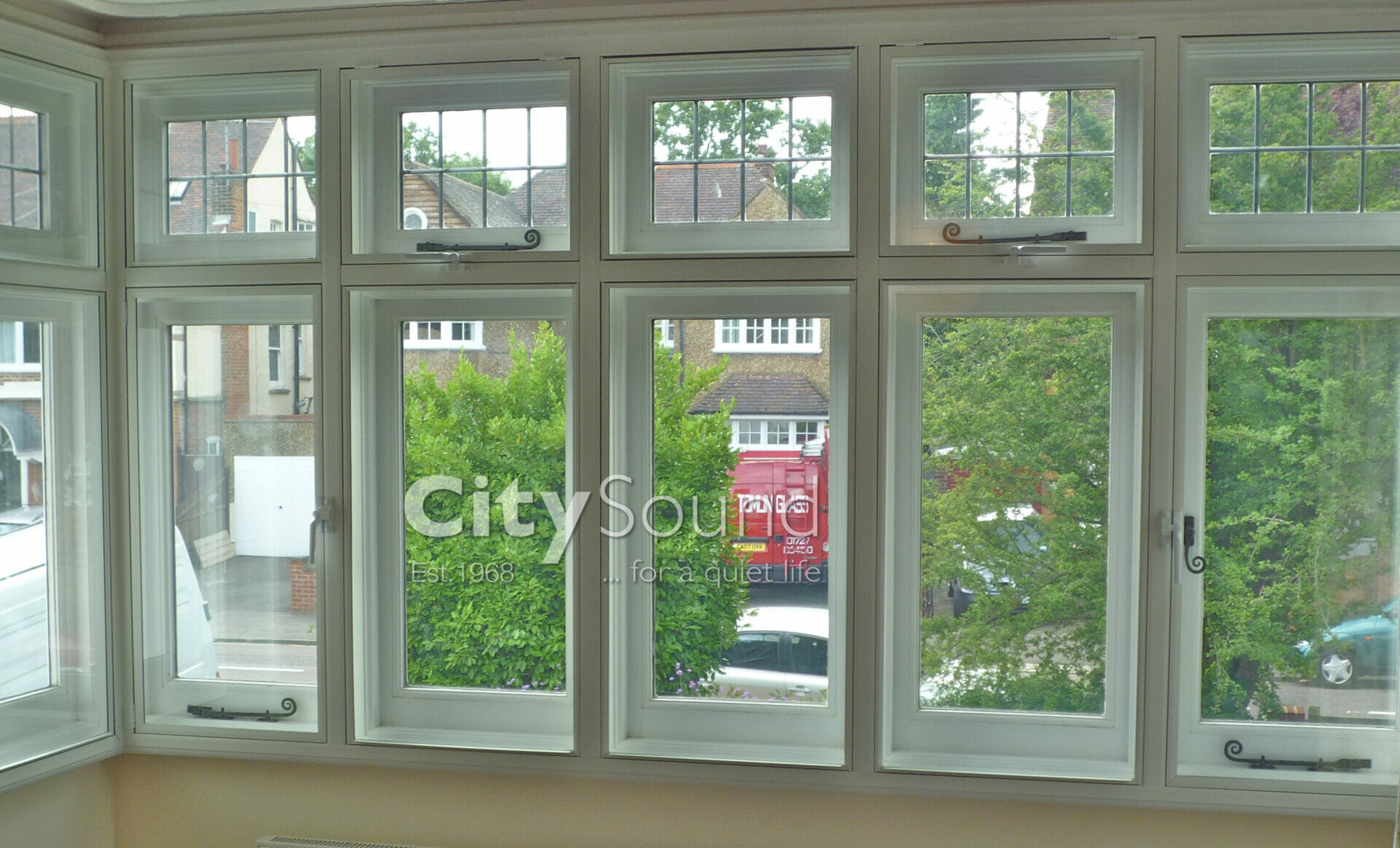 09. Casment (hinge) windows fitted to cover this box bay (London)