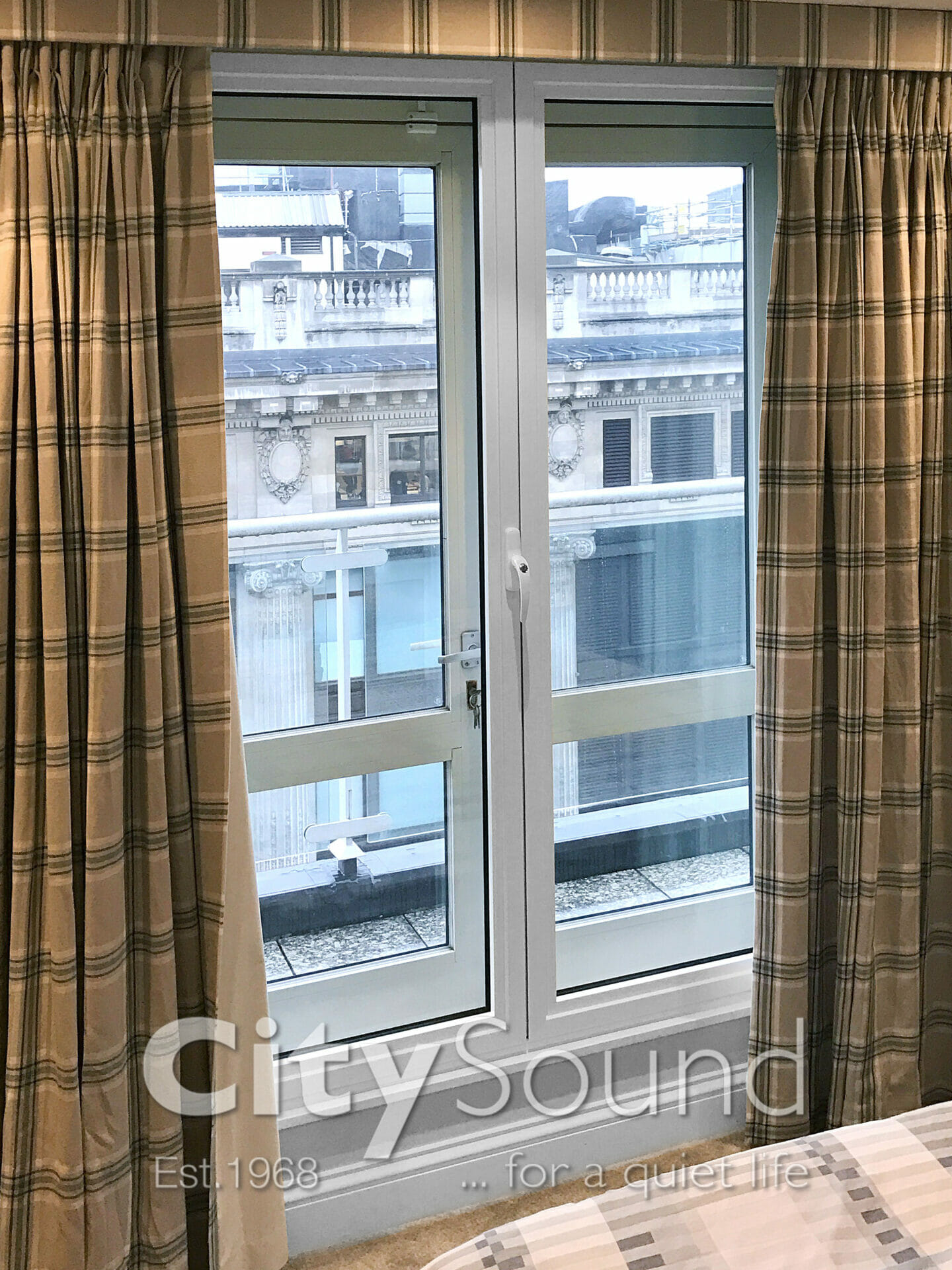 02. Commercial secondary glazing (Double doors) fitted. Glazed with thick acoustic glass for noise reduction (Knightbridge, London)