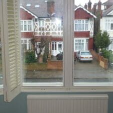 02. Secondary glazing lift out units fitted to this bay window. Shutters refitted once all was done (Finchely, London)