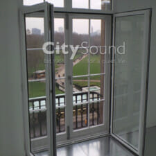 06. Commercial secondary glazing (Double doors) fitted. Glazed with thick acoustic glass for noise reduction (Mayfair, London)